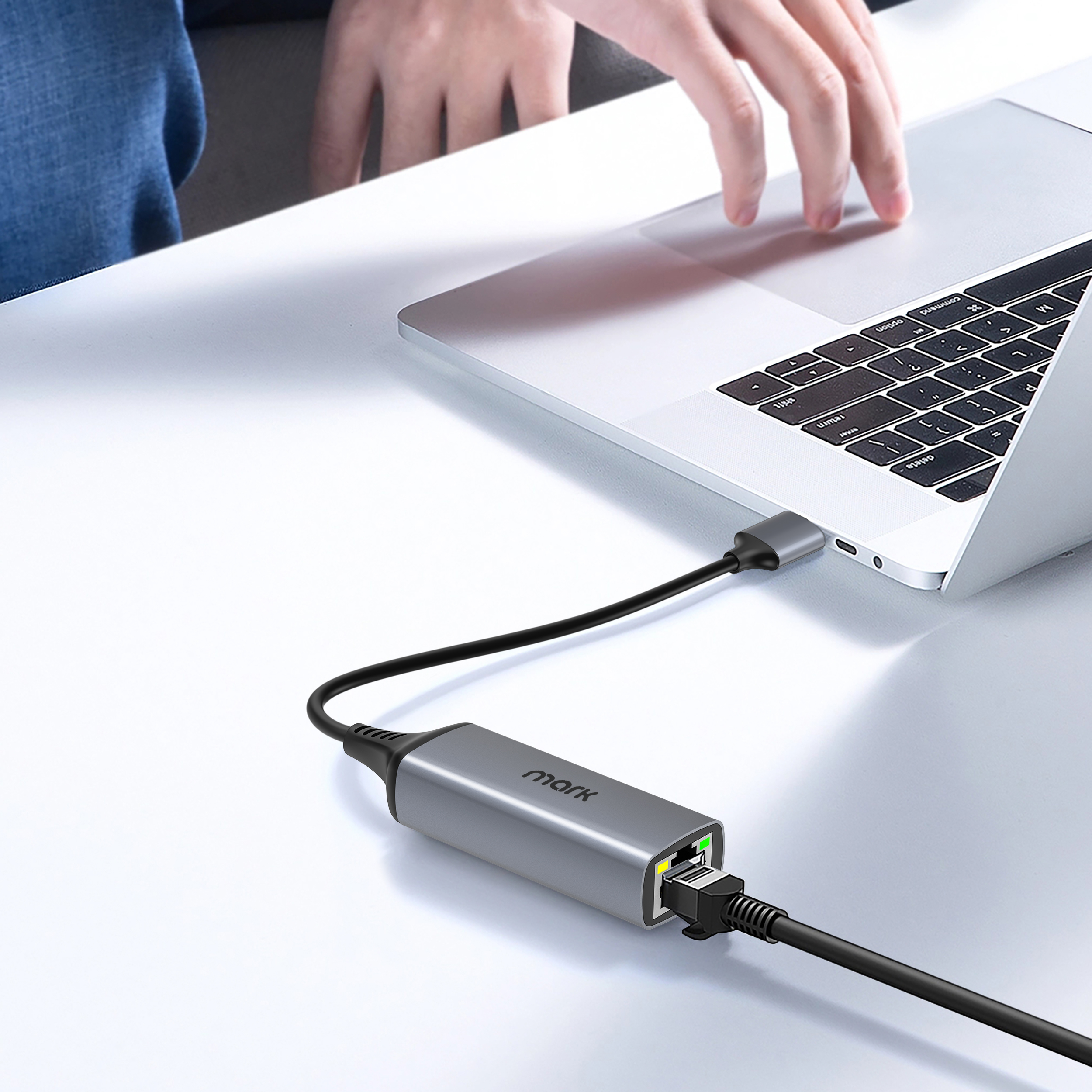 WH3504 USB-A Gigabit Ethernet Adapter connected to a laptop