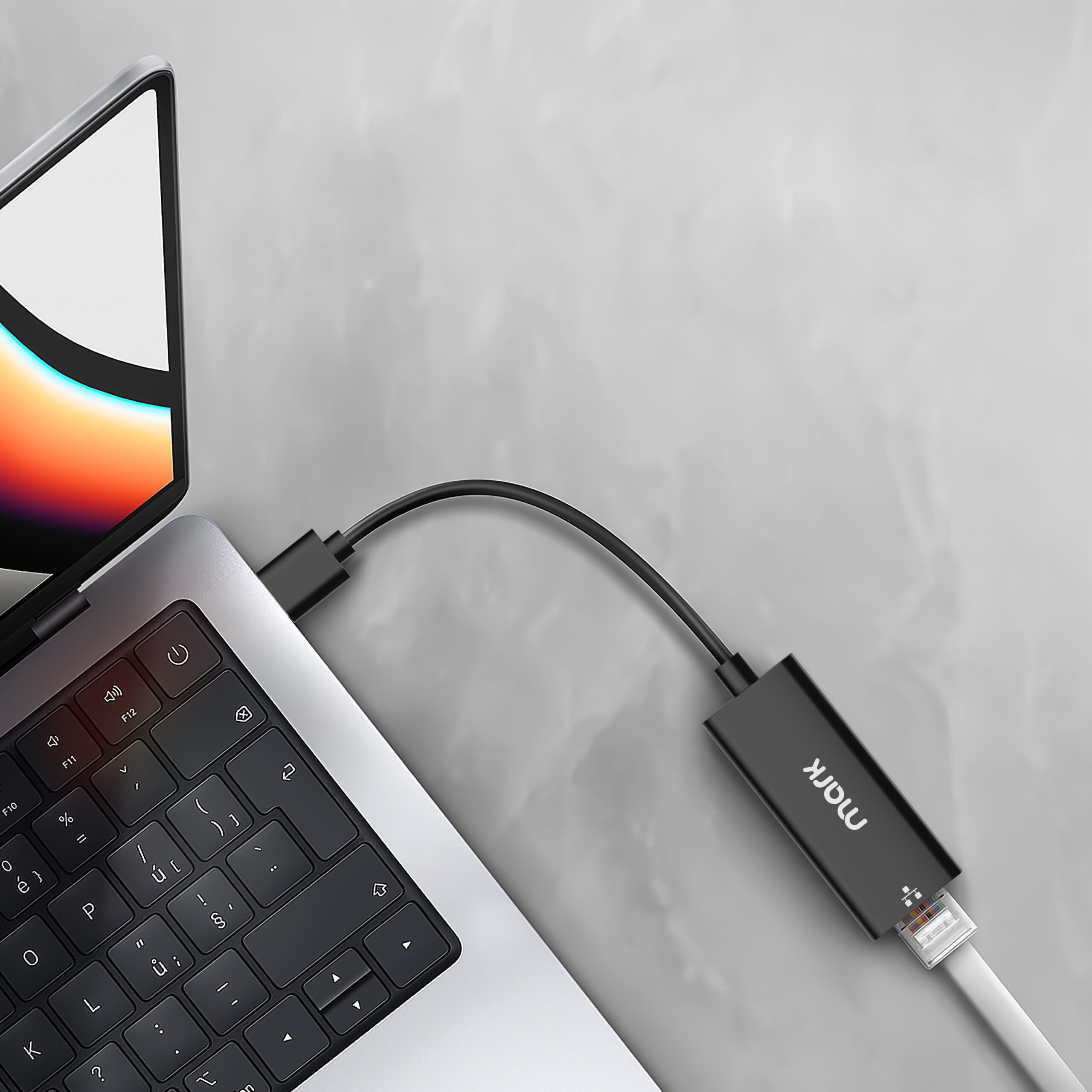 WH7504 USB-A to 2.5G Ethernet Adapter connected to a laptop